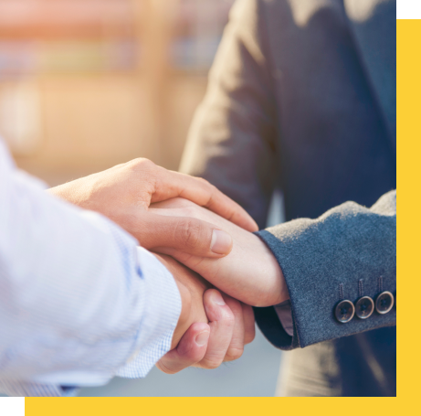 Two business people shaking hands